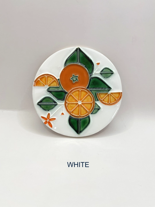 Ręcznie robiona podstawka ceramiczna z motywem pomarańczy