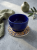 Ręcznie robiona podstawka ceramiczna z motywem ornamentu